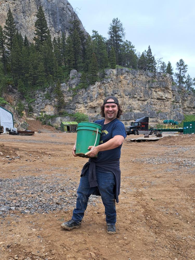 Travis with full bucket of Yogo sapphires